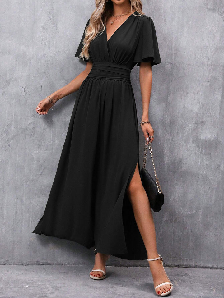 Eterna | Vestido Largo Elegante en Negro con Escote en V Manga Transparente y Abertura
