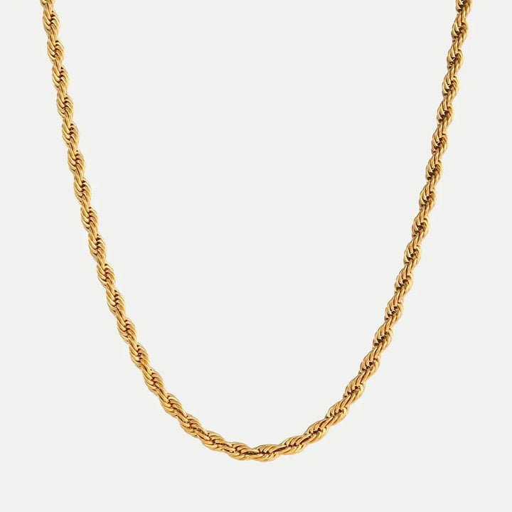 Helena – Collar dorado con decoración punteada.