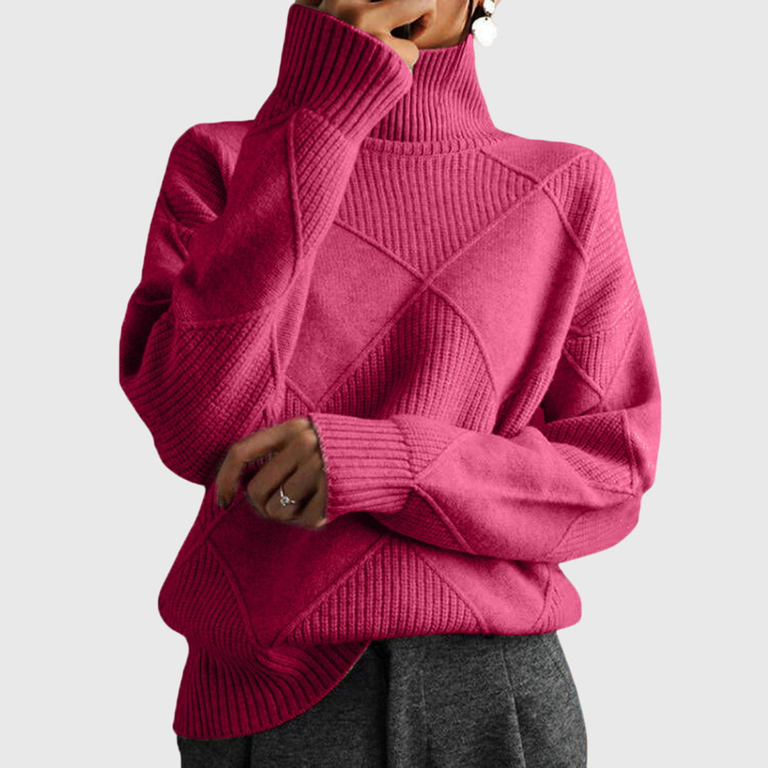 Angela | Jersey de cuello alto con diseño geométrico
