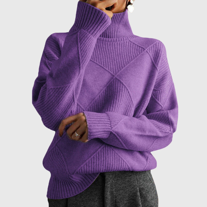 Angela | Jersey de cuello alto con diseño geométrico