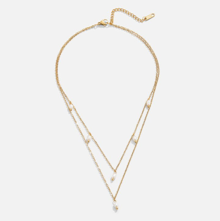 Tanja – Collar dorado de capas con artículo moderno.